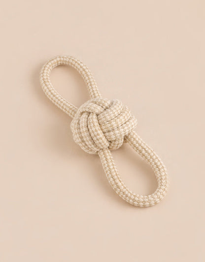 Rope knot toy on a beige background